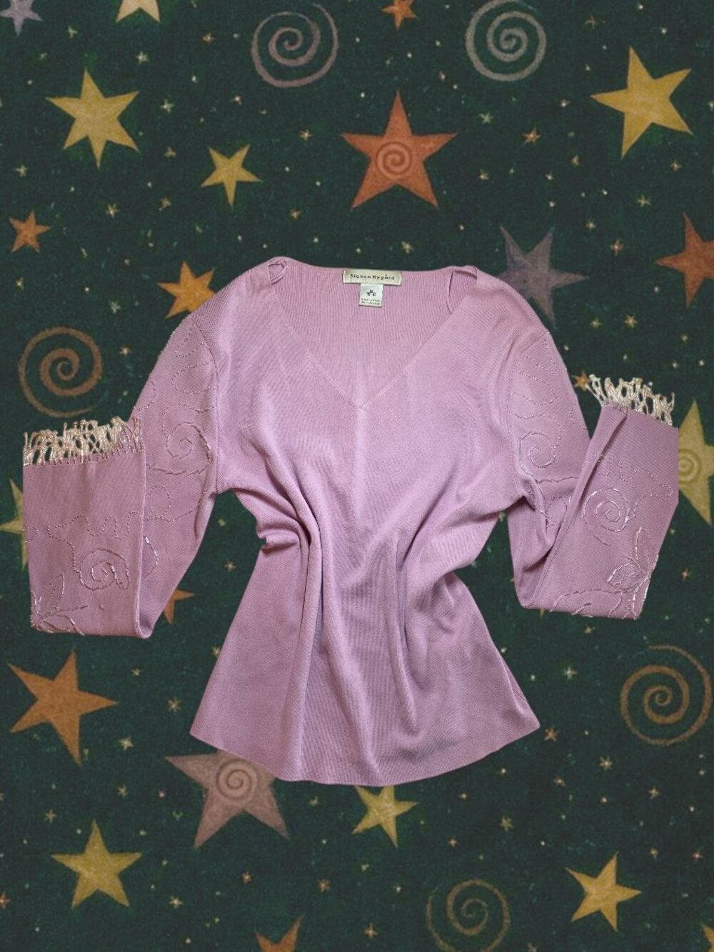 lilac knit top with statement bell sleeves